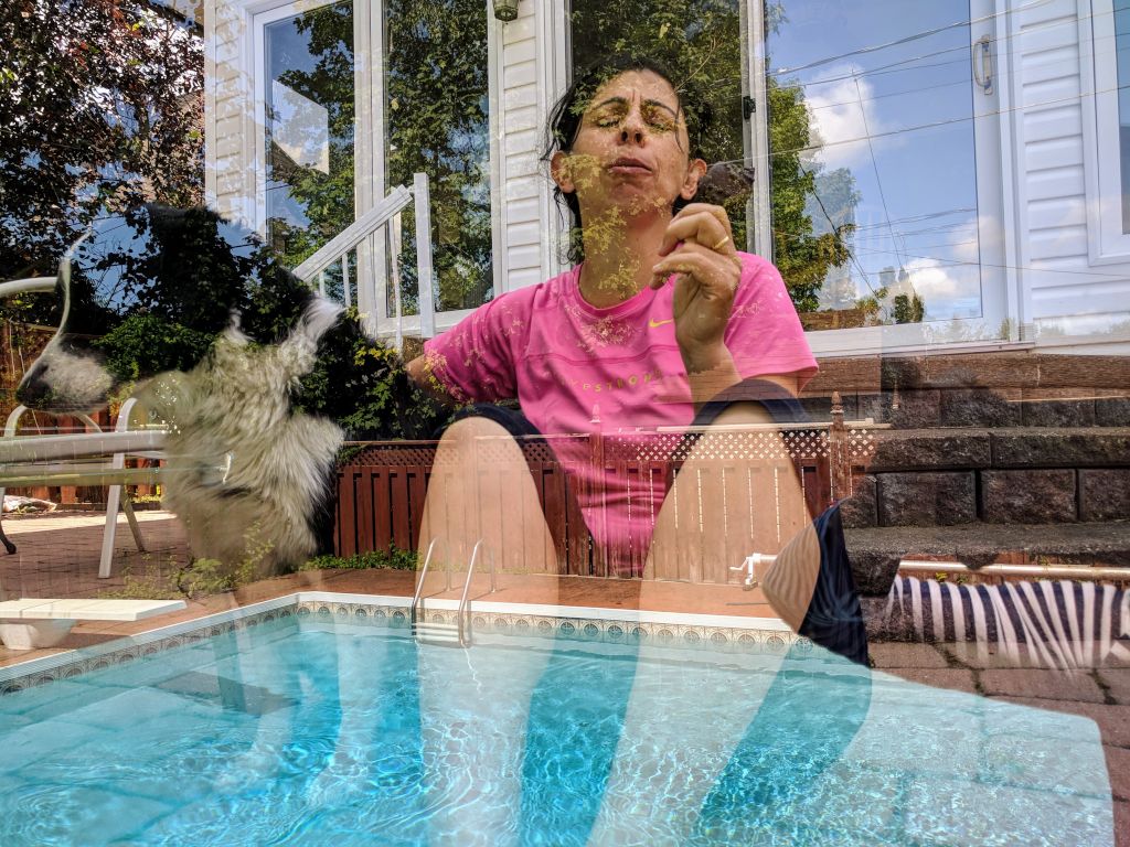 A double exposure showing our swimming pool and Zeynep with JJ in our Gatineau backyard, 2019